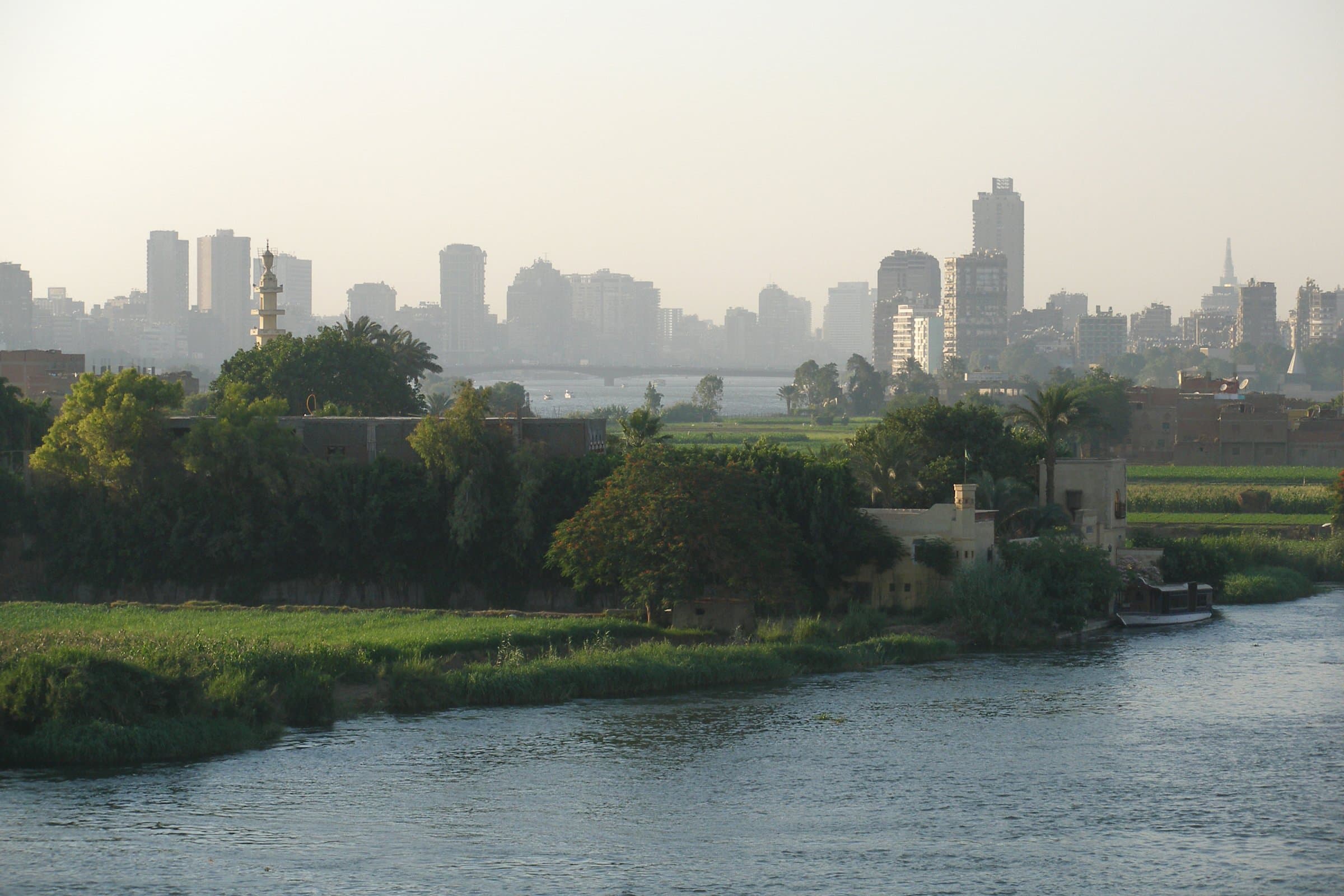 The Cairo skyline and the Nile River, photographed 17 June 2007. Photo: Vyacheslav Argenberg, via Wikimedia Commons (CC BY 4.0). Source page: https://commons.wikimedia.org/wiki/File:Cairo_skyline,_Nile_River,_Egypt.jpg