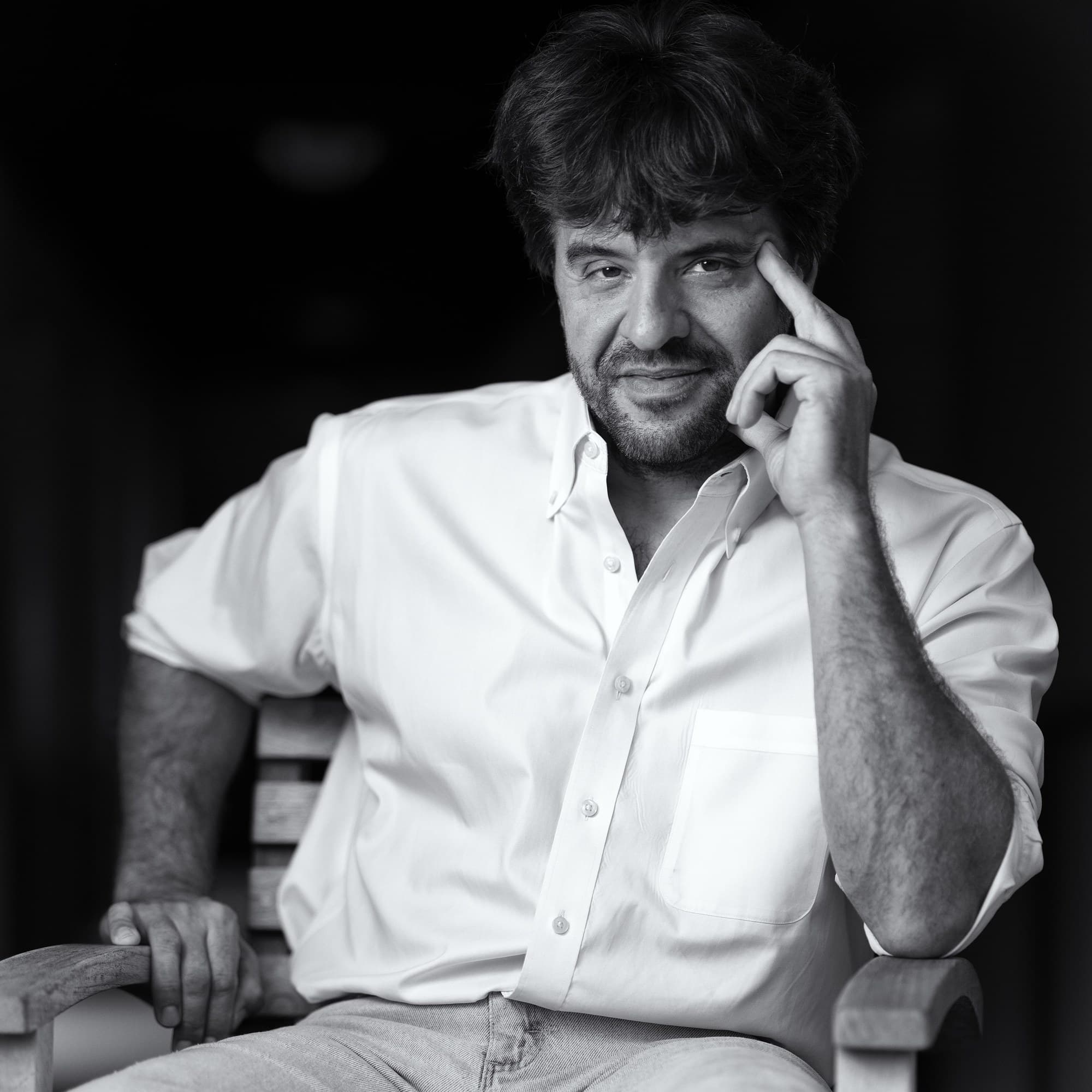 Karl Deisseroth, seated, in a black-and-white portrait, 20 September 2022. Photo: Christopher Michel, via Wikimedia Commons (CC BY-SA 4.0). Source page: https://commons.wikimedia.org/wiki/File:Karl_Deisseroth_by_Christopher_Michel_01.jpg