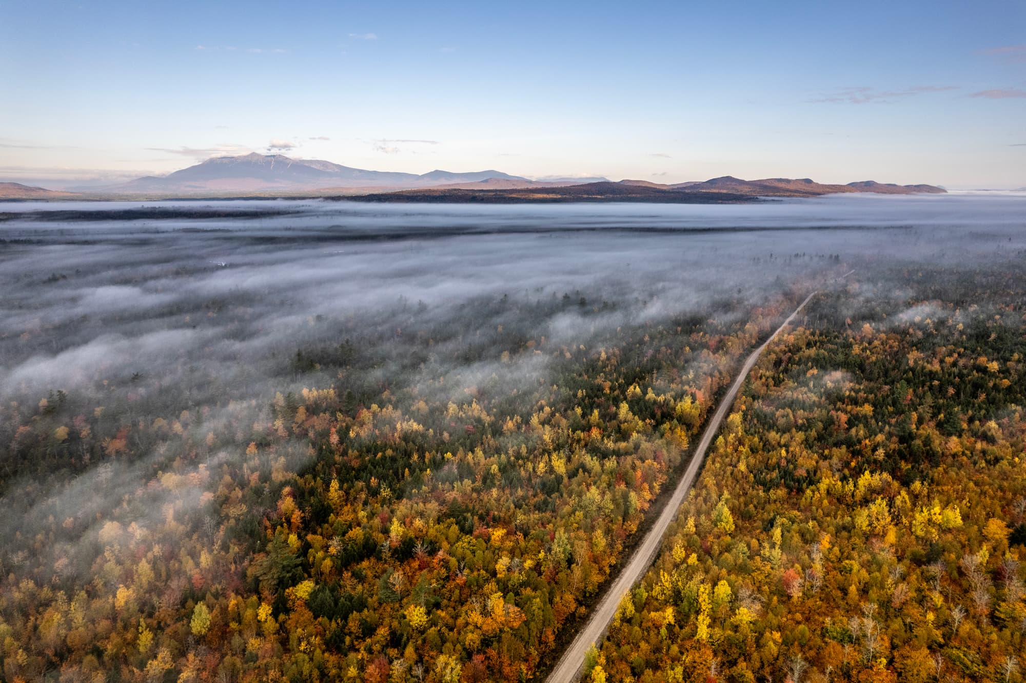 Autumn forest landscape from the Wáhsehtəkʷ land-return effort in Maine’s Katahdin region. Photo: Chris Bennett / Trust for Public Land. Source page: https://www.mainepublic.org/environment-and-outdoors/2026-09-17/11-000-acres-of-ancestral-homeland-returned-to-the-penobscot-nation